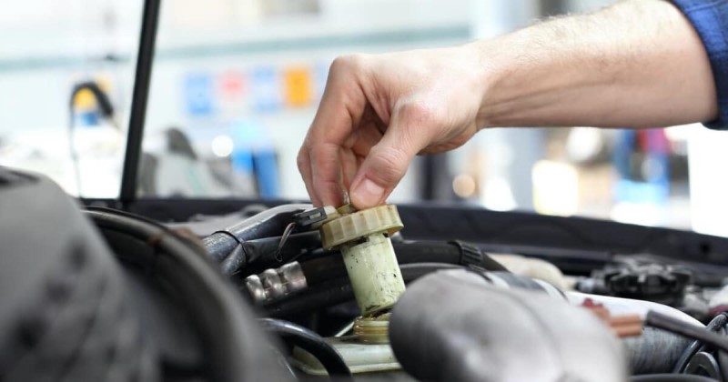 What does brake fluid do